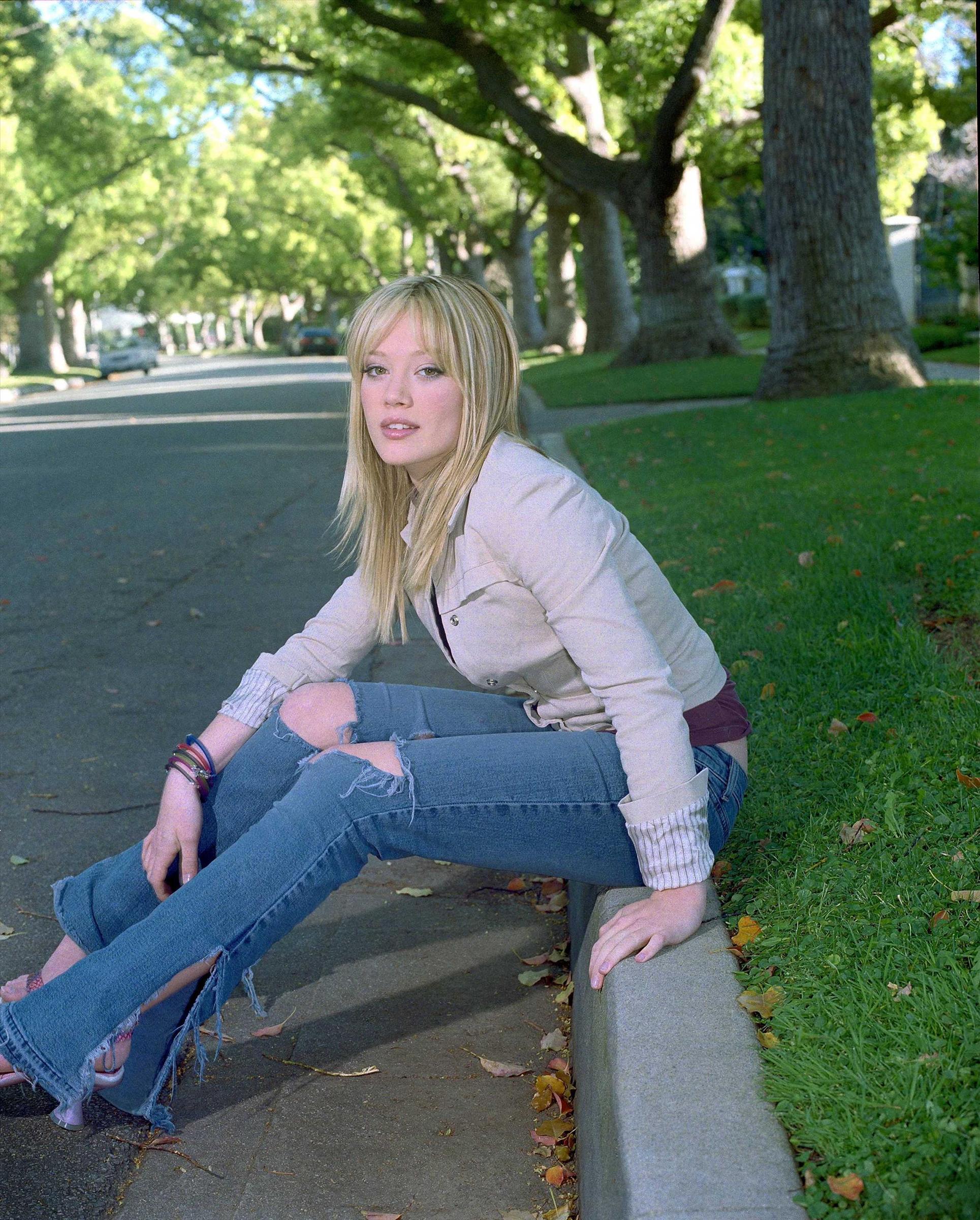 jeans, trees, grass, Hilary Duff - desktop wallpaper
