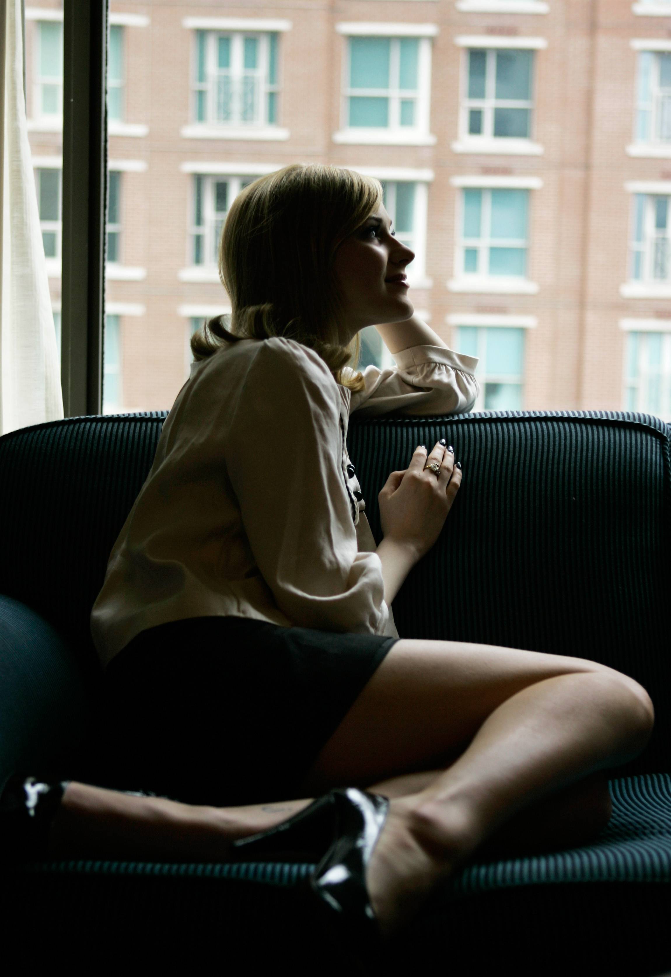 blondes, actress, high heels, Evan Rachel Wood, sitting, window panes, sofa - desktop wallpaper